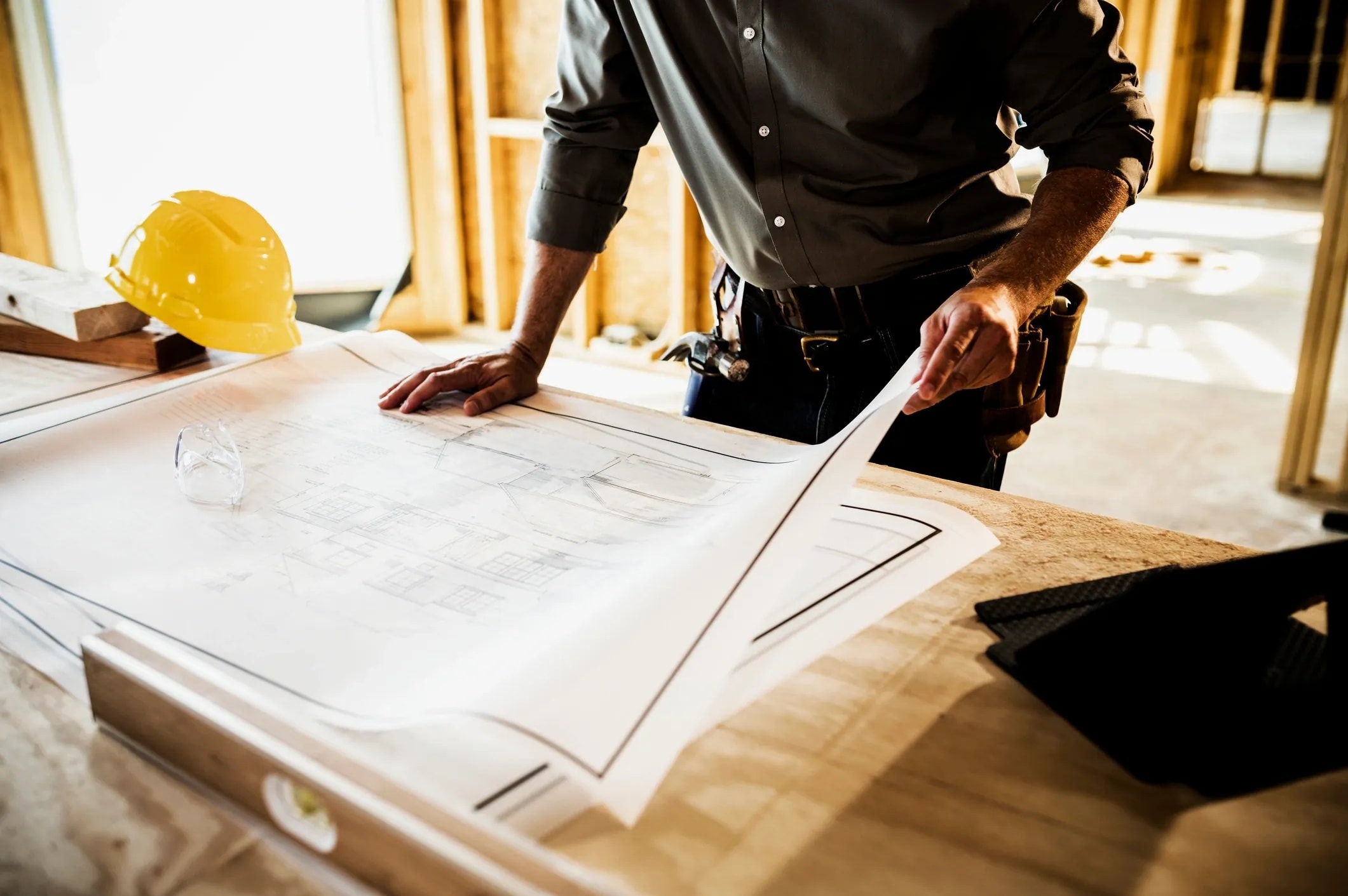 Contractor reviewing project plans